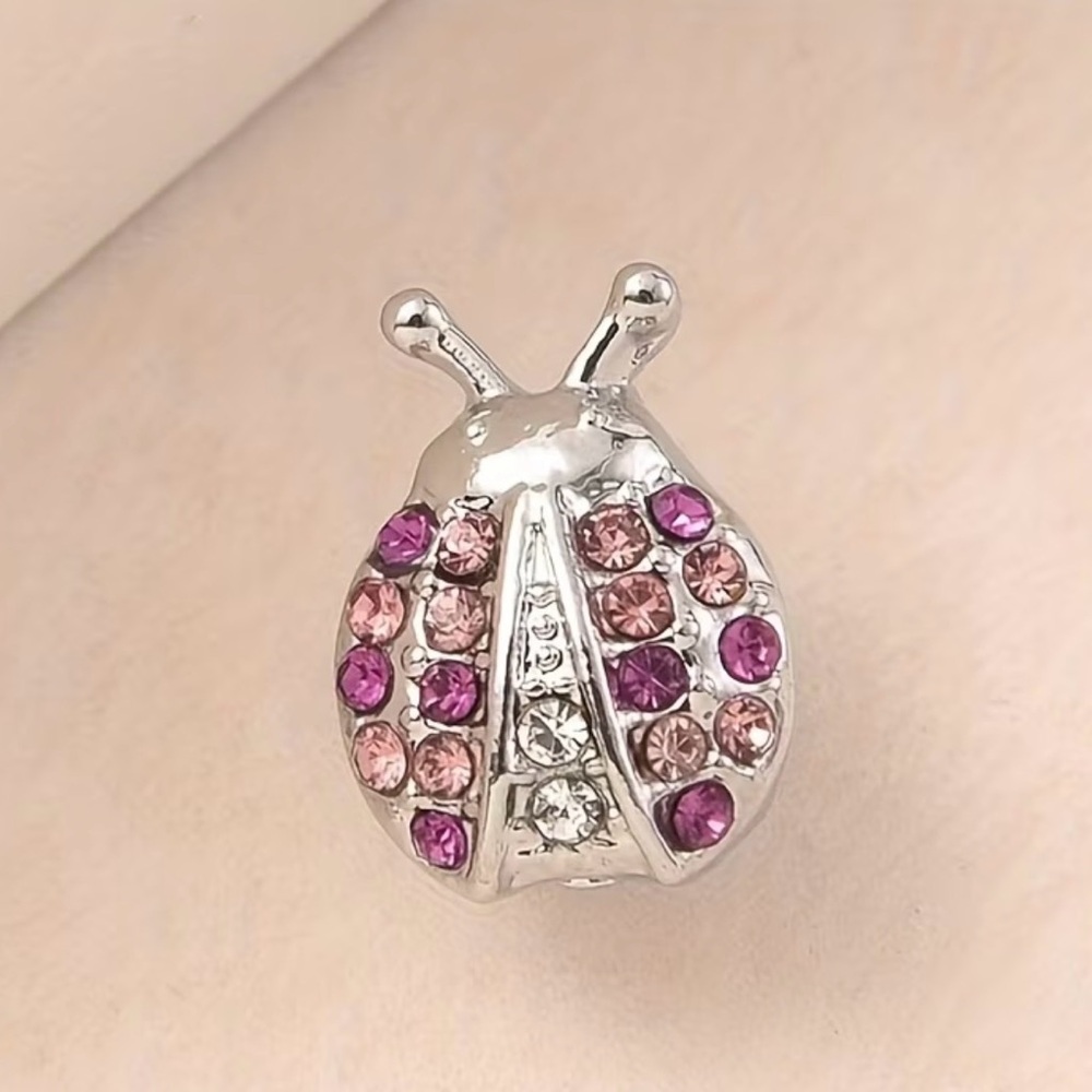 Silver and Pink Ladybug Charm Bracelet
